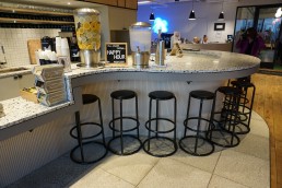 Orion was brought in to produce custom millwork, stone and seating for a new WeWork location in Boston