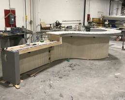 Orion was brought in to produce custom millwork, stone and seating for a new WeWork location in Boston