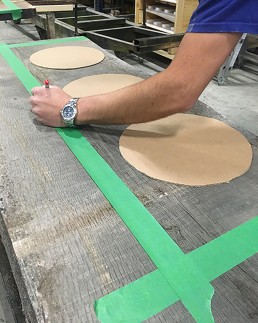 Oak slab being templated for routing