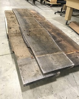 Oak slabs in the warehouse waiting to be processed