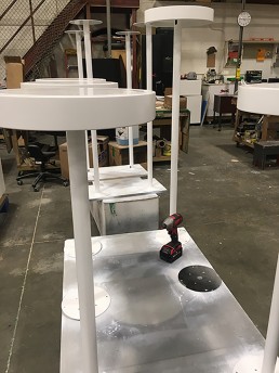 Painted bases to hold vitrines for jewelry displays